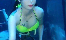 maskless underwater asian girl